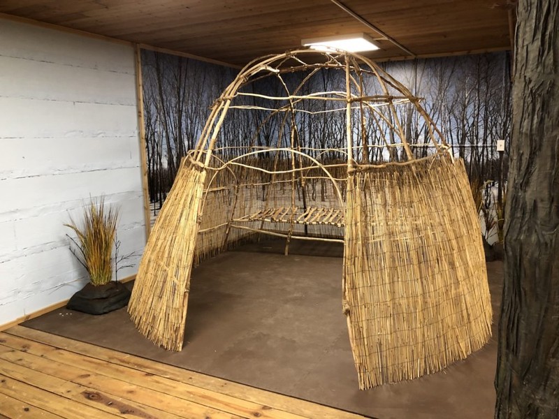 Come inside our replica of a wigwam! The covering is off to make it easier to see how it was built.When the Inoca people moved into their winter villages, they lived in structures called wigwams. A wigwam has a rounded framework of wooden poles tied together. Two layers of mats woven from reeds or rushes covered the outside of the framework making the structure warm and dry. These mats might be 6 feet wide and 60 feet long. The wigwams of the Inoca could be 15 feet wide and 25 feet long. With a hearth in the center, a door at one end, and sleeping and living areas around the outside, one or two families called a wigwam home.