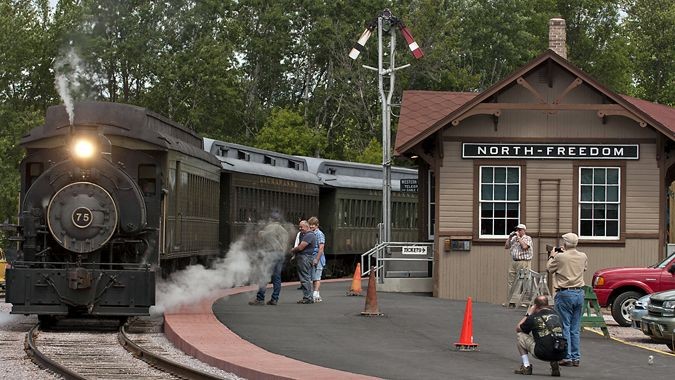 One of the locomotives rides past visitors at the Mid-Continent Railway Museum
