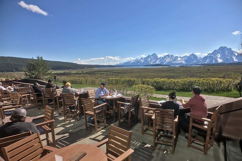 Patrons enjoy the stunning vista from the lodge's rear patio.