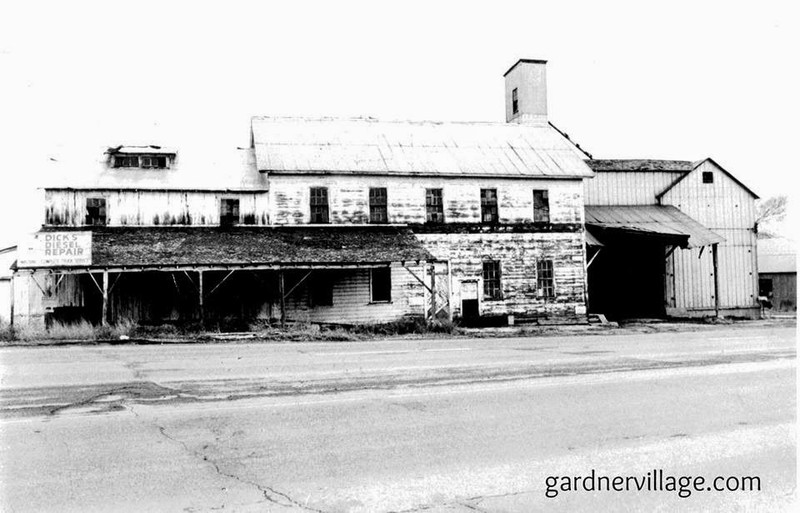 early-mid 20th century photo of mill after years of abandonment before becoming a shopping center. 