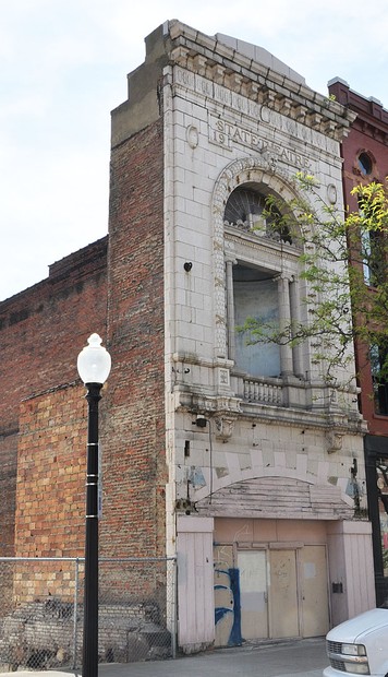 The last remnants of the State Theater, its front facade.  