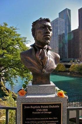 The bust of DuSable is located at the intersection of North Michigan Avenue and the Chicago River.