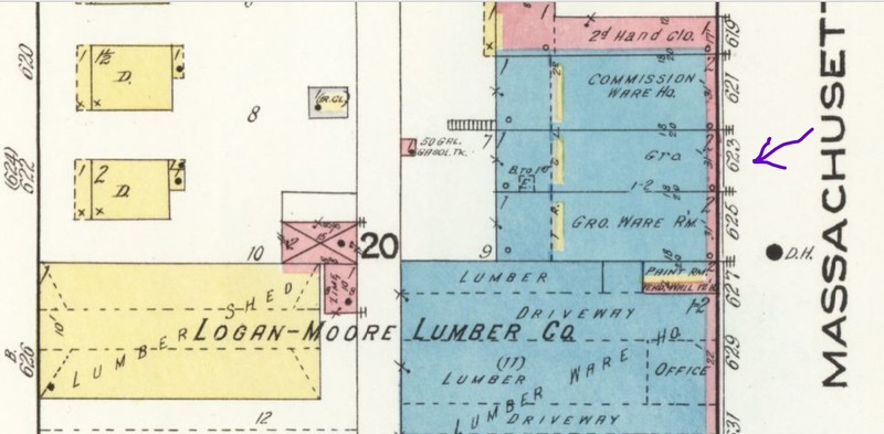 Previous building at 623 Mass. St. (arrow; stone with brick front facade) in 1918 (Sanborn Map Company 1918 p. 2)