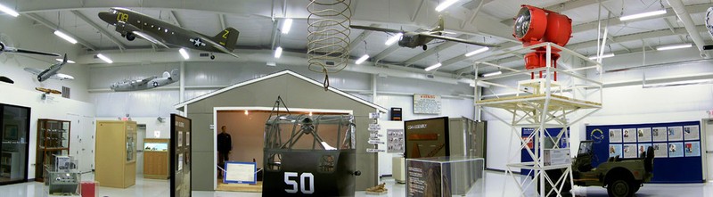 Interior view showing some of the scale model aircraft and the rotating beacon light on the right.