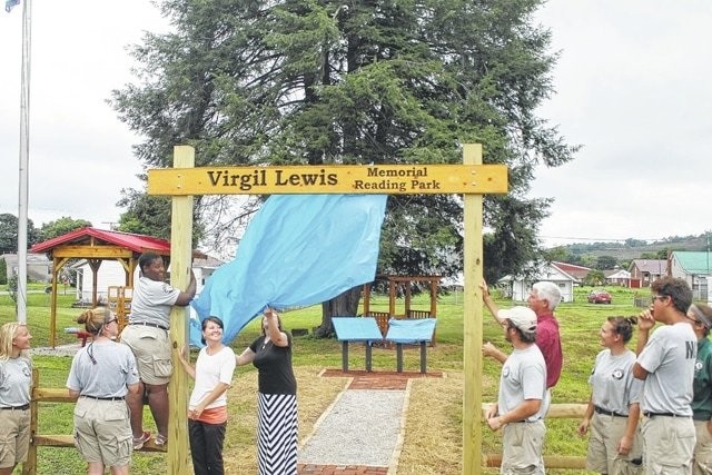 The dedication ceremony for the Virgil Lewis Reading Park in 2015