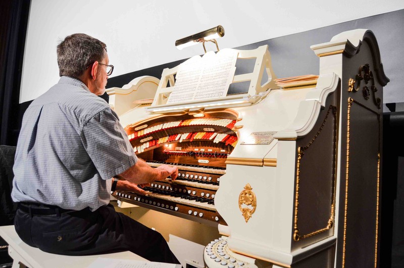 The organist plays the Appell's fully restored 1927 Mighty Wurlitzer.  