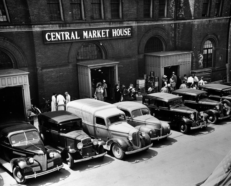 Vendors unload their goods at the market's loading docks in the 1950s.