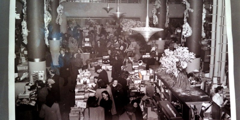 Shoppers making their purchases at the Bon-Ton in early times.