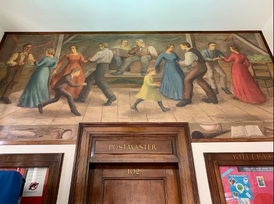 "A Country Barn Dance" the mural hanging in the Ada Post Office that was designed by Albert Kotin in the 1940s. The mural still hangs 12 feet long above the postmaster's door. 