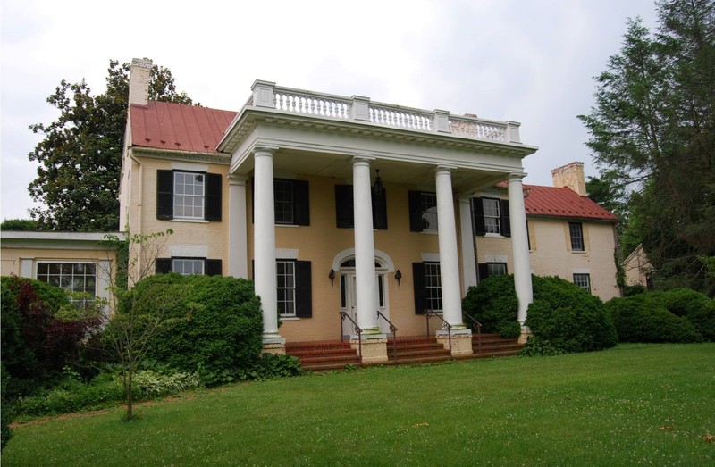 This once Federal style architecture was transformed by Funkhouser in 1943 with the addition of four columns and portico.  