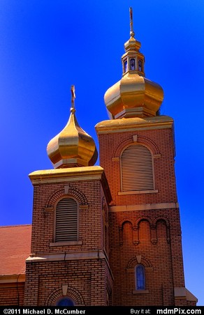 Close-up of the church's two of the church's towers and onion domes.