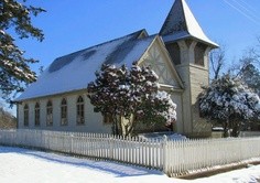 This Carpenter Gothic-style church was built in 1889 to replace an earlier church destroyed by fire. In a 1907 tornado, the structure was  lifted off its foundation and thrown in the street. Locals in Washington pulled it back onto its foundation. 