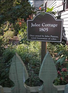 A sign marker indicating Julee's Cottage.