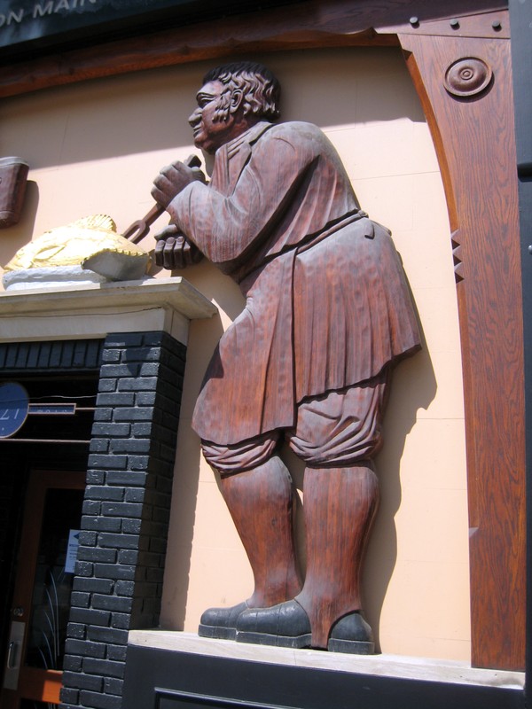 Joachim Jungwirth & Co. Brass Rail Woodcarving, right figure detail, 2020