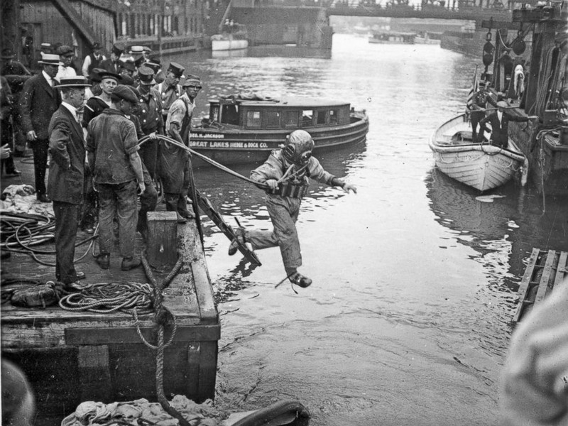 Rescue working jumping into the Chicago River