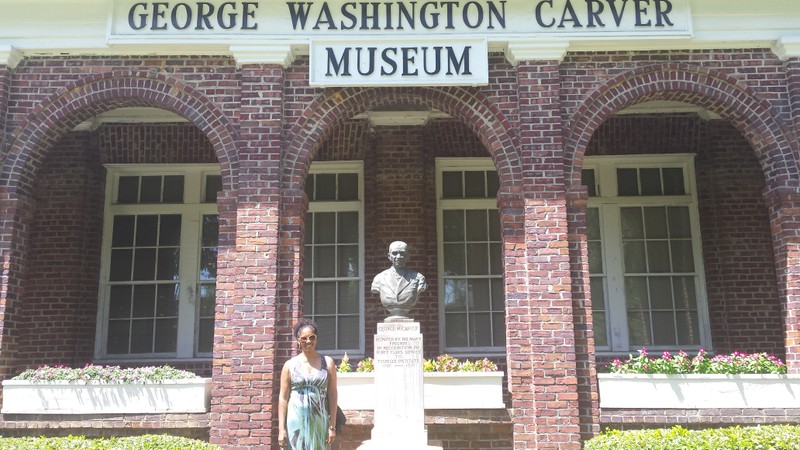 The front of the museum featuring a bust of Carver