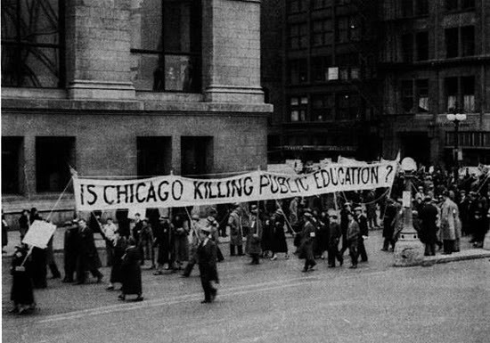 Chicago Teachers met in Grant Park before leading protest marches throughout the Loop, protesting pay cuts and the city's failure to pay teachers. By the time of this protest in March, 1933, many teachers were owed six-eight months of pay. 