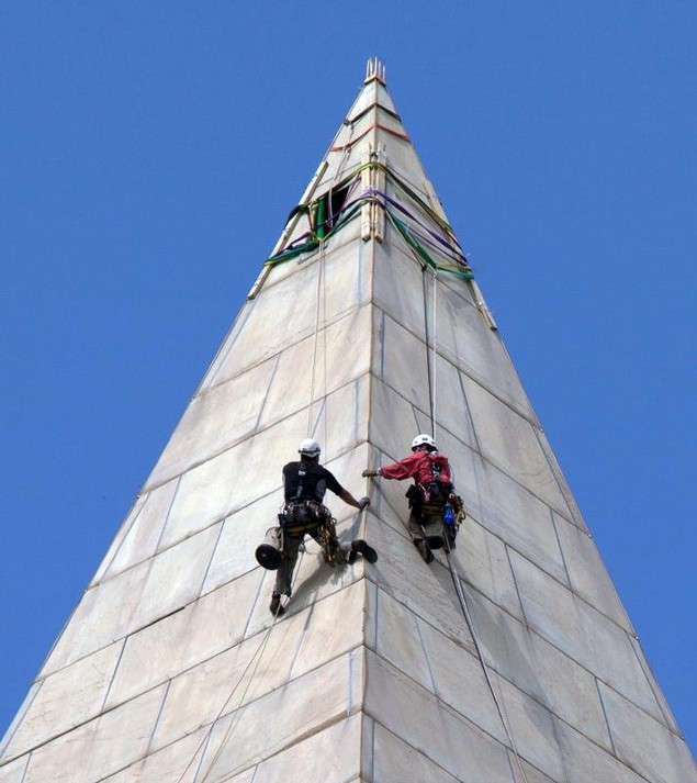 Contractors assess damage to the Washington Monument after the August 23, 2011 earthquake. Photo courtesy of the National Park Service. 