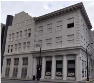 2009 photograph of main facade; 1922 (left), 1907 (right) (Miller)