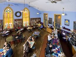 Interior of the café, showing the book shelves in the background.