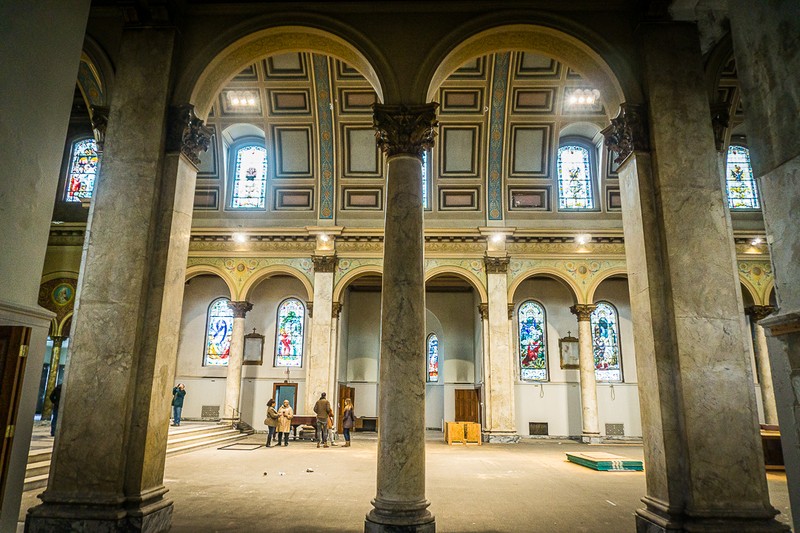 Side view of St. Mark's nave, featuring German-imported stain-glass windows and marble columns