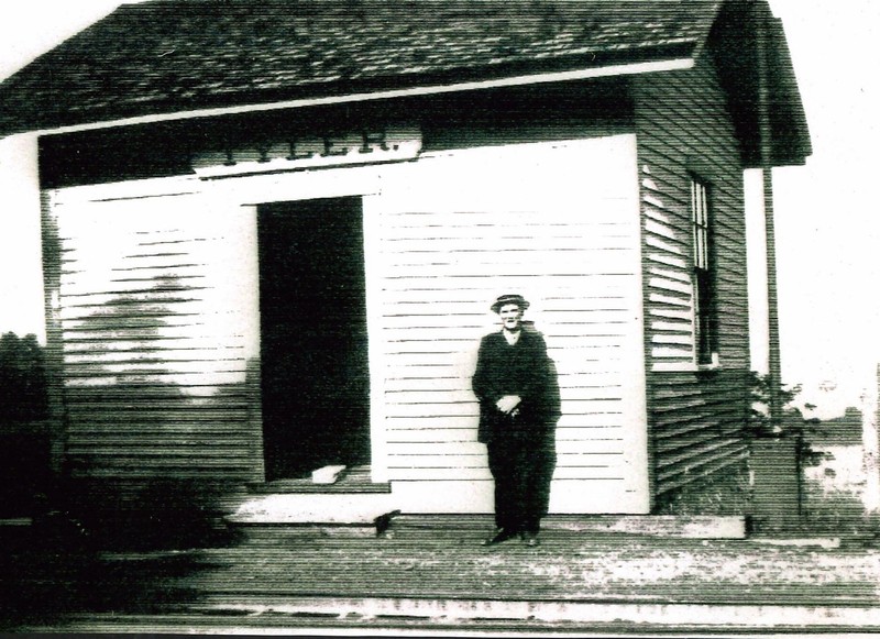 Image of the Tyler Station. The gentleman standing in front of the station is identified as Thomas Card (1871-1957). Mr. Card lived in the Blackwater District close to Tyler Station, and worked in Contoocook Village as a machinist at Kingsbury & Davis. Perhaps on this day he was taking the train from Contoocook to Tyler for his lunch break! Many accounts of K & D workers say they went home for lunch.