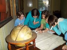 Young students learn what it is like to work at a museum at The Moffatt-Ladd House