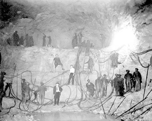 Miners working in the tunnel.