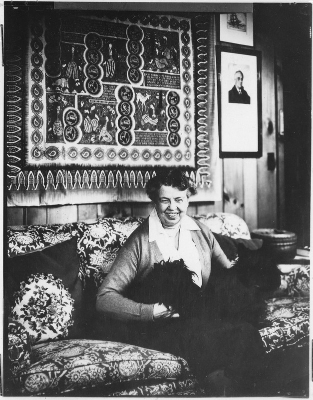 Eleanor Roosevelt posing with her two Scotties, Tamas and Fala, at Val-Kill in 1949