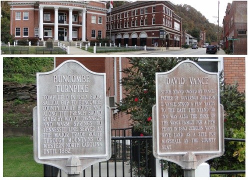 Plaques outside of the courthouse explaining history of the contributor of the land David Vance, and the Asheville Turnpike that ran through the town bringing trade the the town.