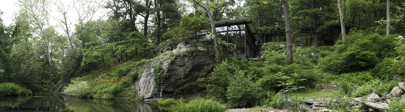 Panoramic view of the the house, blending in with nature as Wright had intended