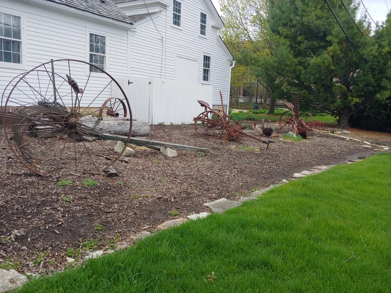 Volunteers plant native crop plants as well as some that were brought by European immigrants in the 1800s