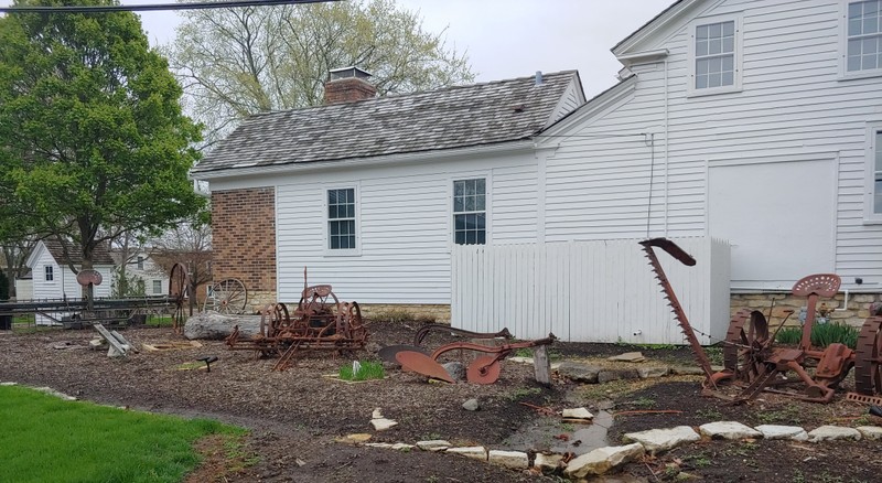 "Lisle: A Farm Town" outdoor display includes horse-drawn farm implements that were used in Lisle.