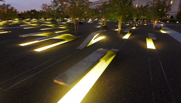 Picture at night displaying the illuminating pond that reflects light below each bench. Photo courtesy of Terry Hall
