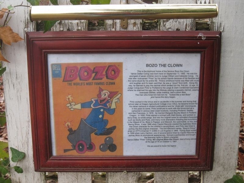 This sign about the history of Bozo the Clown can be found on the white picket fence in the side yard.