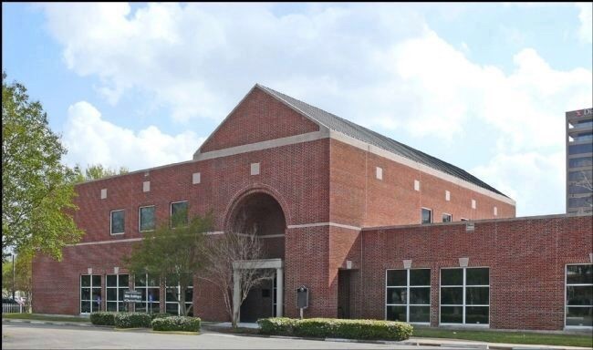 The marker is located at the front of the Clayton Library