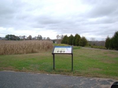 New roadside marker (for 150th anniversary) as seen from side of road