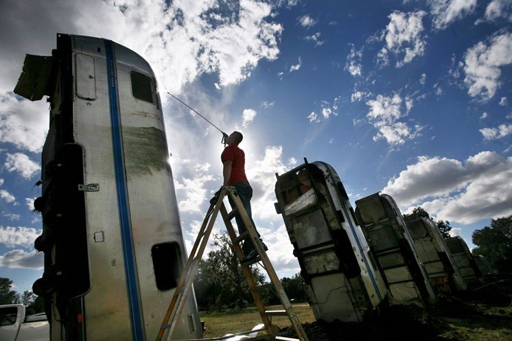 Worker working on one of the RVs