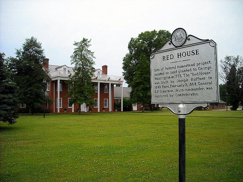 The "Red House" at Eleanor, West Virginia was built by Joseph Ruffner in 1840 and now serves as city hall. It is said to have a secret tunnel leading to the river that was used as a underground railroad. 
Photo Credit: The Town of Eleanor