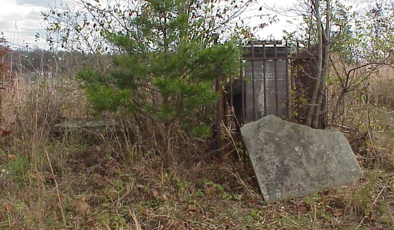 The gravesite is about 200 feet from the base of the electric tower. 