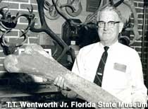 T.T. Wentworth, Jr. with a dinosaur bone