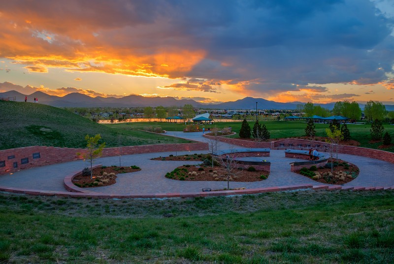 The Columbine Memorial is in Clement Park, near Columbine High School, providing a tranquil field and views of the Colorado foothills for reflection.