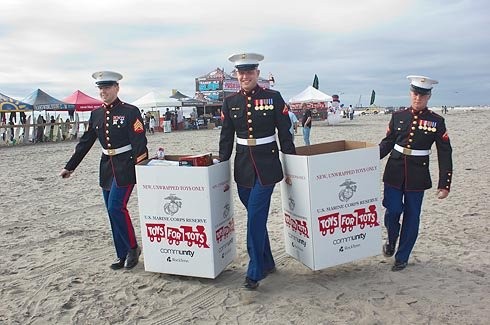 Camp Pendleton Marines collecting Toys for Tots on the beach 