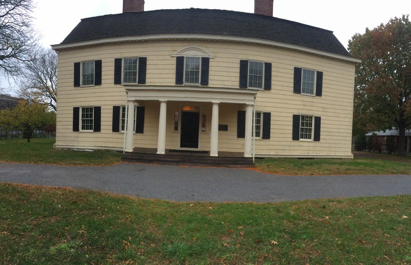 This picture is a panoramic frontal view of King Manor Museum.
