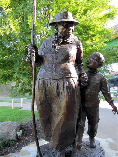 This sculpture of Harriet Tubman was one of several statues commissioned and dedicated in 2004 as part of a walkway between the River Market and Clinton Library. 