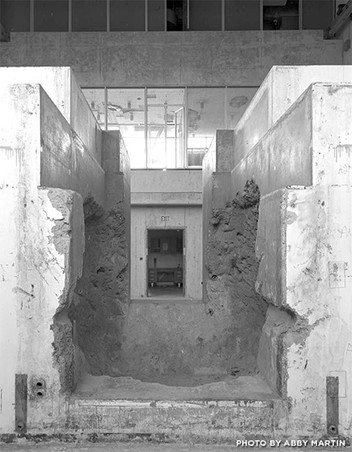 This is another photo by Abby Martin exposing the rough interior of the building. The building was built on the principles of brutalism in which rough concrete was the main focus.