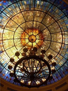 The sanctuary features this ornate stained-glass dome.