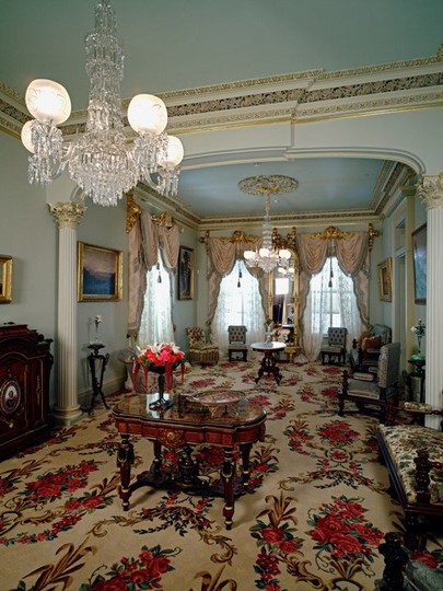 The Main Parlor. Originally built in 1856 by a Gold Rush merchant, it was remodeled twice under the Stanfords' decades of ownership.
