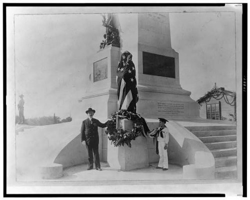 Taken in1903, an unidentified older gentleman and a boy in a sailor uniform stand in front of the Sherman Memorial during or after the unveiling.  