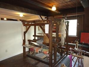 Wooden peg loom display.